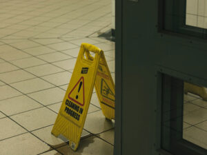 Yellow caution sign for wet floors