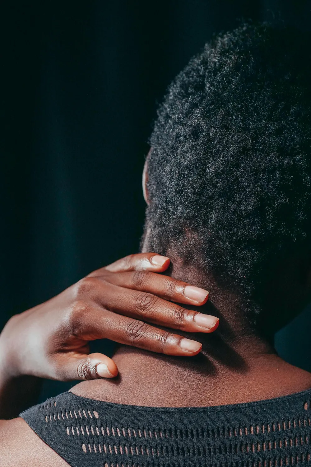 Person Experiencing Neck Pain